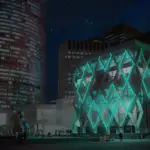 exterior building facade lights up with bioluminescence